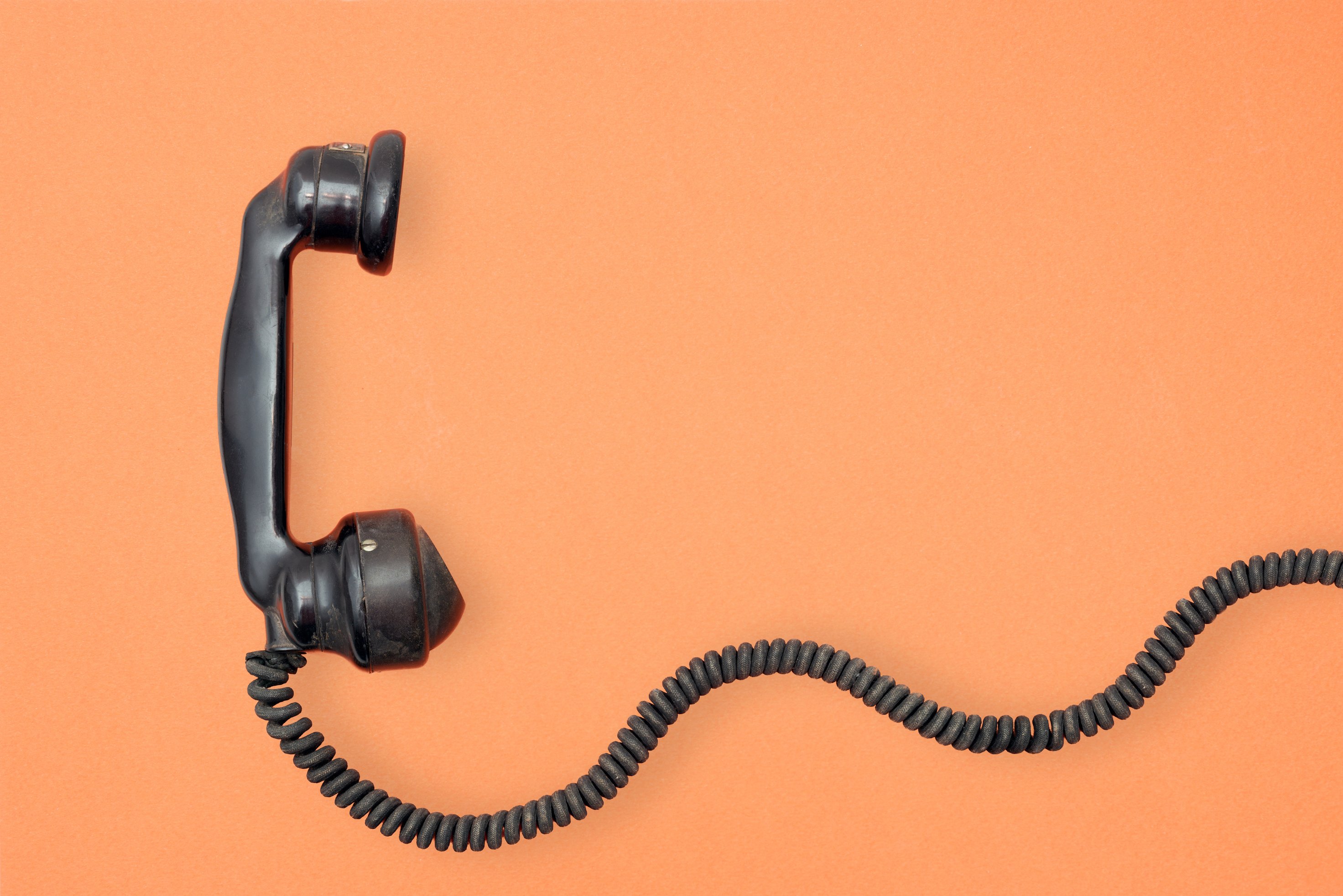 vintage phone on orange background